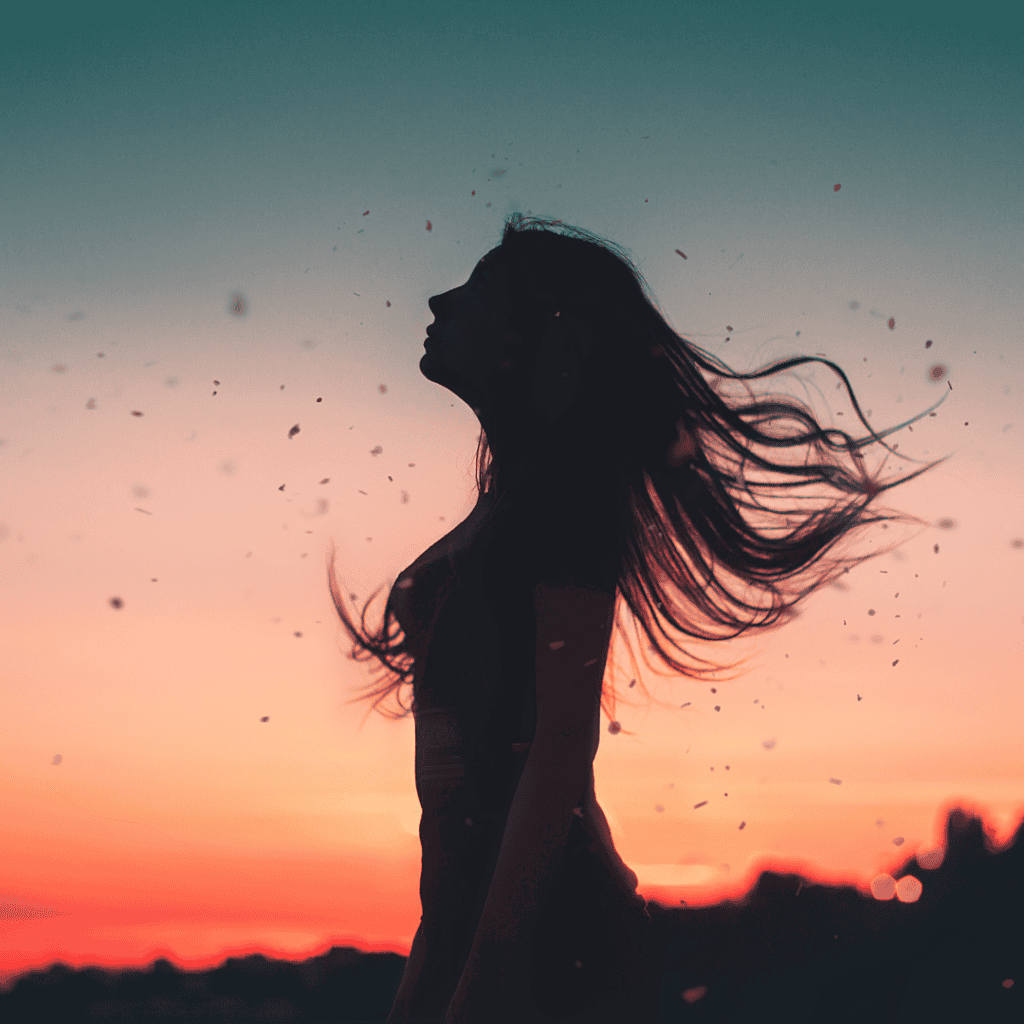 Woman gazing at the moon, symbolizing intuition, spiritual connection, and natural wellness for women’s holistic healing journey.