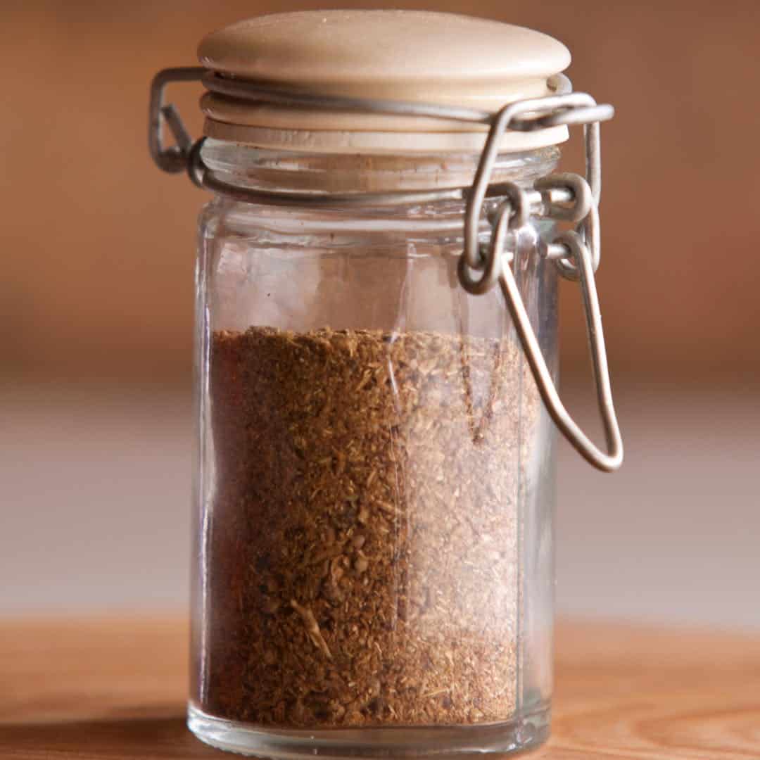 Thanksgiving spices with culinary aromatic herbs to make pumpkin spice in a jar.