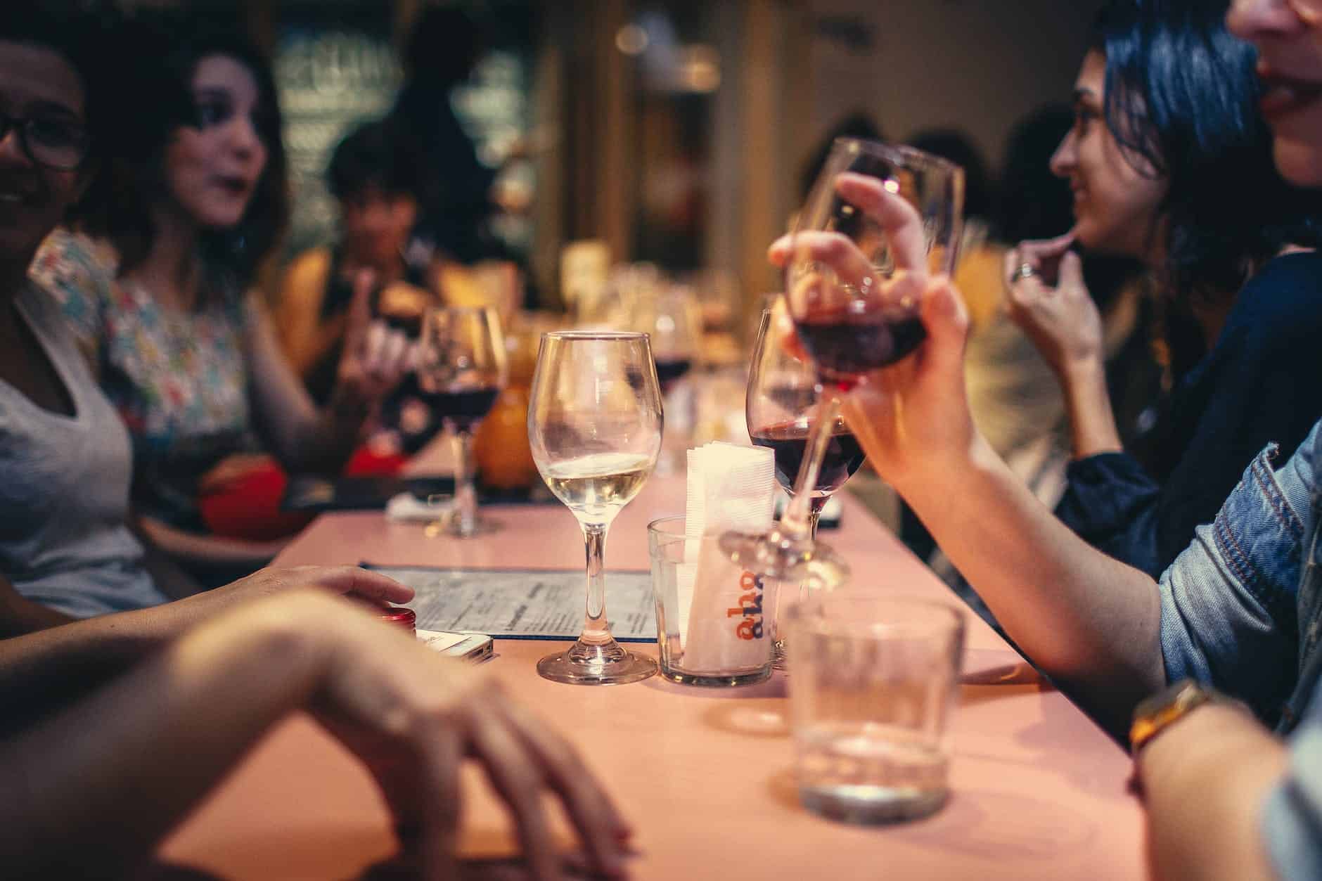 Photo of a family gathering laughing away so it doesn't look stressful.