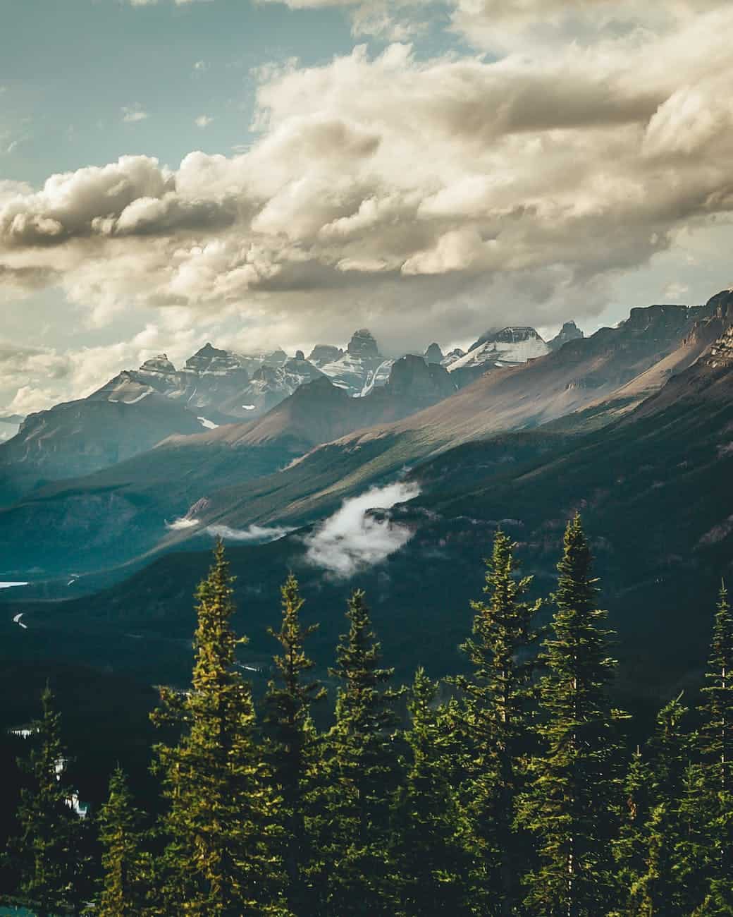 gray mountains under gray sky at daytime