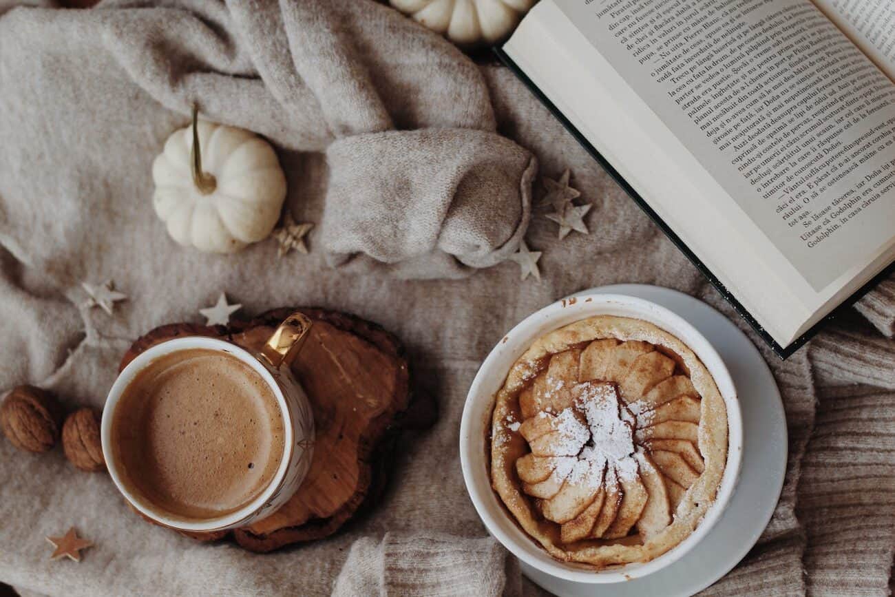 Thanksgiving spices with culinary aromatic herbs on top of holiday drinks.