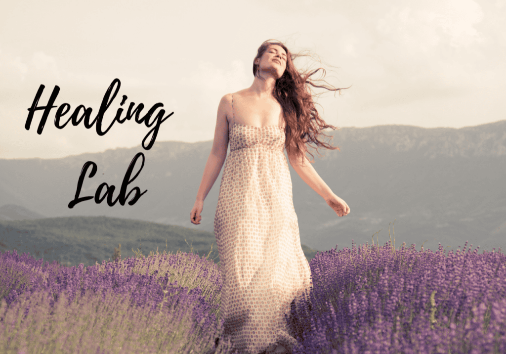 Image of a woman walking near lavender feels looking calm with the words Healing Lab written to the side which is the name of the course in the stress management coaching packages