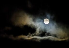 Meaning of magic as the full moon rises in the sky